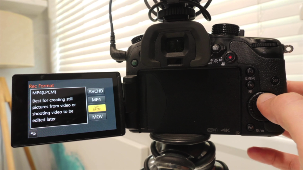 A DSLR camera with the menu & settings open 